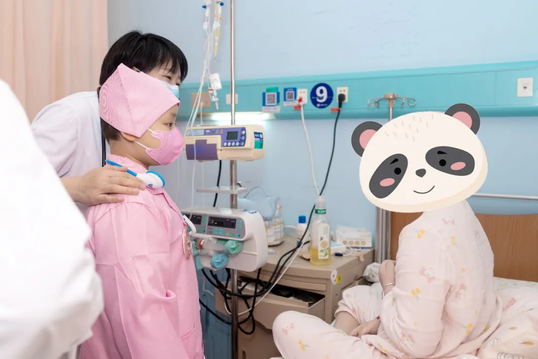 The hematology and oncology nursing team accompanies Qiqi during her Doctor Experience Day